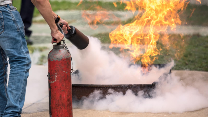 Fire testing of construction materials in UAE laboratory with technician and specialized equipment