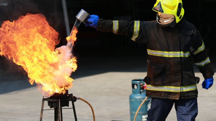 Fire testing of construction materials in UAE laboratory with technician and specialized equipment
